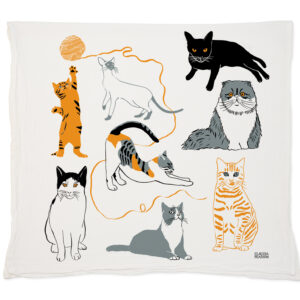 Decorative pillow featuring playful illustrations of various cats.