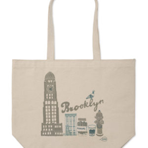 A beige tote bag with Brooklyn-themed illustrations.