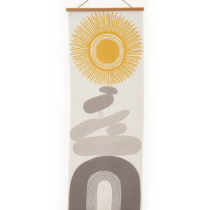 Minimalist wall hanging with sun and abstract shapes in neutral colors.