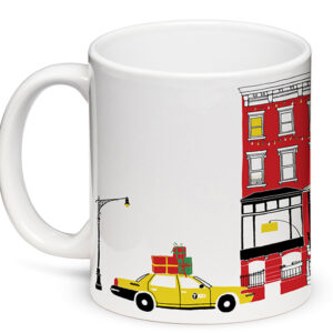 A white mug with a New York City taxi and building illustration.