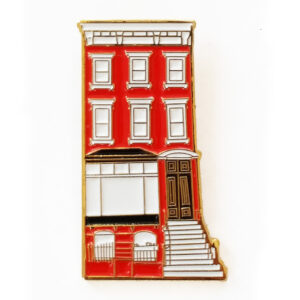 Pin of a red building with stairs and windows.