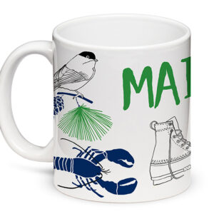 A white mug with nature-themed illustrations and the word 'MAINE'.