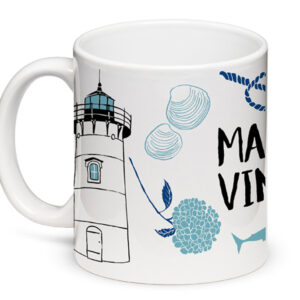 White mug with a lighthouse and sea-themed design.