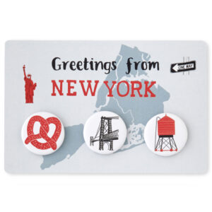A New York-themed fridge magnet set with iconic symbols.