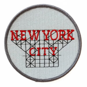 A round patch with a geometric design and 'NEW YORK CITY' text.