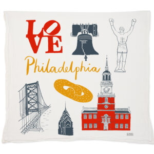 Decorative pillow featuring Philadelphia landmarks and the word 'LOVE'.