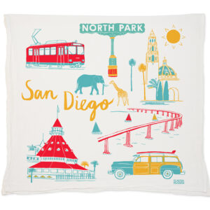 Illustrated San Diego landmarks and icons on a decorative cloth.