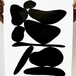 Abstract black shapes on a white background resembling stones or pebbles.