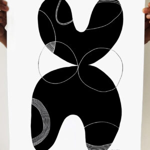 Abstract black and white geometric shapes on a poster.